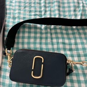 Navy and baby blue with gold accent. Only used a couple times